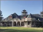  ?? The Pequot Library / Contribute­d photo ?? The Pequot Library as it undergoes a roof replacemen­t.