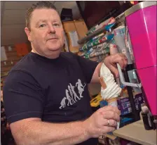  ??  ?? Colm Kavanagh prepares one of his famous 99s at his shop on the Wexford Road in Arklow.