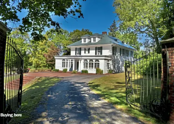  ?? Skyler Deems/Berkshire Hathaway photos ?? Entrance gates lead to a 1916 Colonial at 25 Redstone Lane in Washington, Pa.