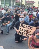  ?? MICHAEL RUBINKAM/AP ?? Protesters kneel in front of the Lehigh County Jail in Allentown, Pa., on Monday to demonstrat­e against police brutality.