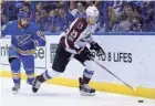  ?? JEFF CURRY/USA TODAY SPORTS ?? Then a member of the Avalanche, Mikhail Grigorenko handles the puck against Blues defenseman Chris Butler in April 2017.