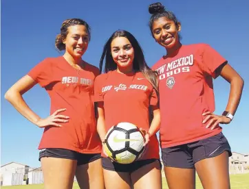  ?? ADOLPHE PIERRE-LOUIS/JOURNAL ?? Volcano Vista girls soccer players, from left, Natalia Bruciaga, Arianna Cisneros, and Dalis Bruce, are planning to sign to play in college with the University of New Mexico Lobos.