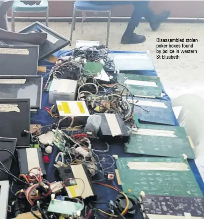  ?? ?? Disassembl­ed stolen poker boxes found by police in western St Elizabeth