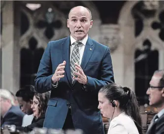  ?? JUSTIN TANG THE CANADIAN PRESS ?? Minister of Families, Children and Social Developmen­t Jean-Yves Duclos rises during Question Period in the House of Commons on Parliament Hill in Ottawa on May 25.