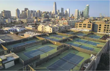  ?? Photos by Carlos Avila Gonzalez / The Chronicle ?? The San Francisco Tennis Club in the South of Market neighborho­od is set to be torn down for constructi­on of office and residentia­l projects, but they have been put on hold by the COVID19 pandemic.