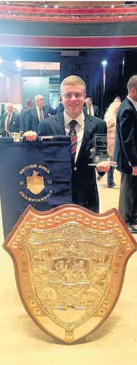  ??  ?? Ross Dunne of Cory, who reached the semi-final of Radio 2’s Young Brass Award 2017, with the 2016 British Open Champions Shield