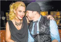  ?? ERIK KABIK/ RETNA ?? Jenny McCarthy and husband Donnie Wahlberg plan to drop in to Wahlburger­s burger joint at Bally’s this weekend.