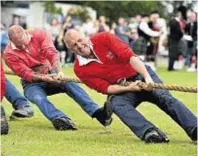  ??  ?? Tug o War Ellon Team take the strain