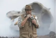  ?? Chuck Zlotnick /Warner Bros. ?? John Goodman plays a government official in charge of mapping out an expedition in “Kong: Skull Island.”