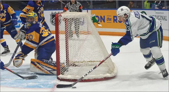  ?? STEVEN MAH/SOUTHWEST BOOSTER ?? Swift Current Broncos forward Sergei Alkhimov (right) made a bid for a wraparound goal early in Saturday’s loss to the Saskatoon Blades.