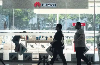  ?? FRED DUFOUR AFP/GETTY IMAGES ?? Huawei representa­tives said they’re confident they can prove it was actually CNEX that stole technology from the Chinese giant.