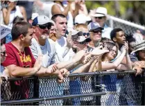  ?? CONTRIBUTE­D BY ANDRES LEIVA ?? Fans cheer during Keiser University’s inaugural home game against Georgetown (Ky.) College. Keiser lostdespit­e a stirringco­meback.