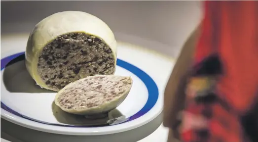  ?? Photos Anja Barte Telin ?? Clockwise from above, haggis, the national dish of Scotland; a century egg, which has been aged until the yolk becomes cheesy and the whites are jelly; kumis, or fermented mare milk, from Russia; and durian, the smelliest fruit in the world