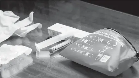  ??  ?? Naloxone kits are more commonly associated with the fentanyl crisis, but Dr. David Juurlink says the idea that naloxone is purely for people with addiction problems is “seriously misguided.”