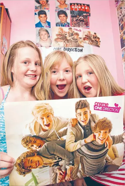  ?? Photo: MAARTEN HOLL/FAIRFAX NZ ?? Can’t wait: From left, Charlotte
Wiltinson,
Ivy Gatland-griffin and Lily Gatland-griffin are excited to have
tickets for the One Direction concert.