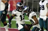  ?? RICK SCUTERI - THE ASSOCIATED PRESS ?? Eagles wide receiver Travis Fulgham, left, and Quez Watkins celebrate the latter’s touchdown last Sunday in Arizona.