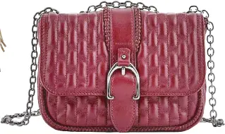  ??  ?? Longchamp Amazone Matelasse comes in soft, full lambskin material with vertical topstitchi­ng.