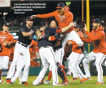  ?? PHOTO AFP ?? Les joueurs des Nationals célébrant leur victoire en quatre matchs.