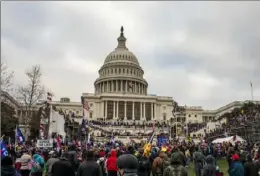  ?? Jason Andrew/The New York Times ?? A pro-Trump mob storms the Capitol on Jan. 6 in Washington.