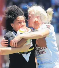  ?? PHOTO: GETTY IMAGES ?? Head to head . . . Apii NichollsPu­alau, of New Zealand, is tackled by Beth Sutcliffe, of England, during a Rugby League Women’s World Cup semifinal match at Southern Cross Group Stadium in Sydney yesterday.