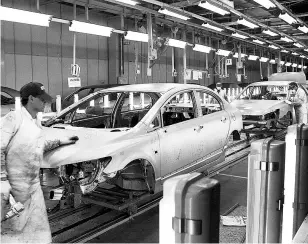  ??  ?? Car bodies on an assembly line: Only a well-thought-out road map will ensure progress