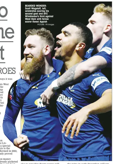  ?? PICTURE: PA Images ?? BEARDED WONDER: Scott Wagstaff, left, celebrates scoring his second goal and AFC Wimbledon’s third against West Ham with fellow scorer Kwesi Appiah