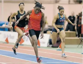  ?? GREG PENDER/THE Starphoeni­x ?? U.S. sprinter Brittney Reese, centre, wins the 50-metre women’s dash
at the K of C Games at the Saskatoon Fieldhouse on Thursday.