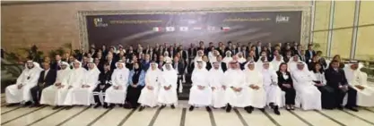  ??  ?? KUWAIT: Officials pose for a group photo during the ceremony.