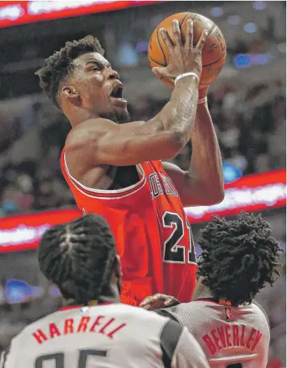  ?? | GETTY IMAGES ?? Jimmy Butler had 24 points and 11 rebounds and played great defense Saturday against Rockets star James Harden.