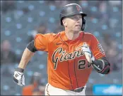  ?? KARL MONDON — BAY AREA NEWS GROUP ?? The Giants’ Buster Posey watches his 2-run homer in the third inning against the San Diego Padres on May 7 in San Francisco.