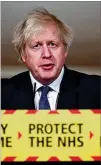  ?? LEON NEAL/POOL VIA AP ?? At a news conference Friday, British Prime Minister Boris Johnson said the new variant of the coronaviru­s, which was first discovered in the south of England, may be linked with an increase in the mortality rate.