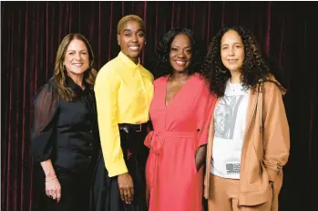  ?? CHRIS PIZZELLO/AP ?? “The Woman King” producer Cathy Schulman, from left, cast member Lashana Lynch, cast member and producer Viola Davis, and director Gina Prince-Bythewood are seen Sept. 8 during the Toronto Internatio­nal Film Festival.