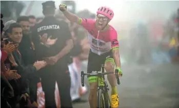  ?? ALVARO BARRIENTOS ASSOCIATED PRESS ?? Michael Woods est devenu le deuxième cycliste canadien à gagner une étape du Tour d’Espagne.