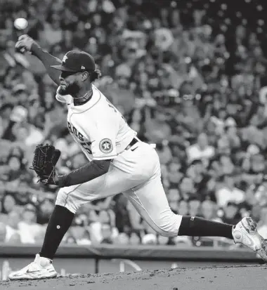  ?? Karen Warren/Staff photograph­er ?? Astros starting pitcher Cristian Javier worked six scoreless innings Saturday in Houston’s 2-1 win over the Tampa Bay Rays at Minute Maid Park. Javier extended his scoreless streak to 25 1⁄3 innings in the victory.