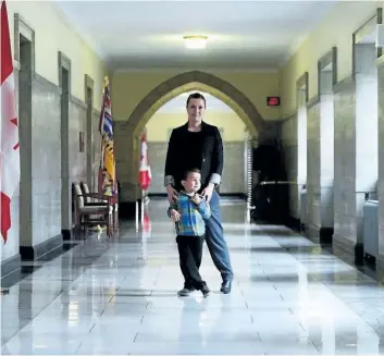  ?? SEAN KILPATRICK/THE CANADIAN PRESS ?? Heather Harder and her son Sebastian Khan, 3, of London, Ont., visit Parliament Hill to voice their concerns for Canada’s No Fly List Kids on Monday. Sebastian’s name is one of many kids who are on the no-fly list.