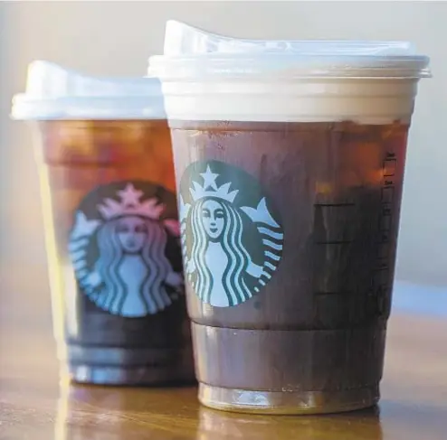  ??  ?? Starbucks announced a new lid design on Monday that makes straws obsolete.