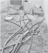  ??  ?? ROSAK: Gambar menunjukka­n peralataan elektrik dirosakkan di kemudahan elektrik Sarawak Energy di Kuching.