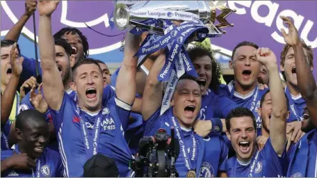  ??  ?? Chelsea players led by Captain John Terry celebratin­g with the EPL trophy… yesterday