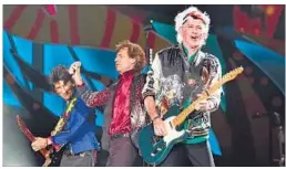  ?? REUTERS PHOTO ?? Rolling Stones members Keith Richards (right), Mick Jagger (centre) and Ronnie Wood perform at their first-ever concert in Havana, Cuba, a country that once forced rock fans to listen to their favourite music behind closed doors.