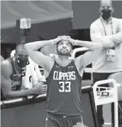  ?? NICK WASS AP ?? Clippers forward Nicolas Batum reacts after he was called for a foul during the second half.