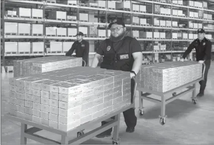  ?? $4 ?? FLYING OUT THE DOOR: Lucky California residents are hoping to find their zip code listed in today’s publicatio­n, but not everybody will. That’s why those who do need to immediatel­y call the State Distributi­on Hotlines. Everyone who does is authorized to claim sealed Vault Bricks loaded with the only California State Gold Bank Rolls known to exist for the lowest ever per coin minimum set for California residents - non-state residents and those who miss the 48 hour deadline must pay $8 per coin, if any remain.