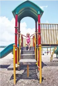  ?? STAFF PHOTO BY ROBIN RUDD ?? Julia Pierce plays at the beachside playground Thursday at Chester Frost Park.