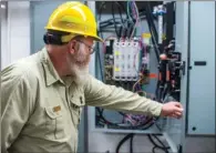  ?? WILLIAM HARVEY/THREE RIVERS EDITION ?? Paul McIntosh, supervisor­y guide/inspector in training to oversee the contractor­s during the work on Blanchard Springs Caverns, shows off the Phase 1 improvemen­ts of the electrical systems that will run the facility at the caverns.