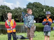  ?? LISA BURD/ STUFF ?? Henry Lowe, and Finn and Rory Gardiner had a great day fishing at Lake Rotomanu at the 2021 Family Trout Fishing Day.