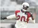  ?? ROB SCHUMACHER/THE REPUBLIC ?? Dre Kirkpatric­k (20) is attempting to win a starting cornerback job opposite Patrick Peterson with the Cardinals.