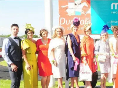  ??  ?? Donna Mackin (centre), winner of the Best Dressed Lady Competitio­n at Dundalk Stadium, with the other finalists, Manager, Marshes Shopping Centre.