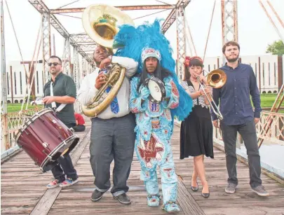  ?? COURTESY OF CHA WA ?? Mardi Gras Indian funk band Cha Wa will perform Friday during Milwaukee’s Bastille Days festival.