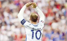  ??  ?? This file photo taken on June 27, 2016 shows England’s forward Wayne Rooney celebrates the team’s first goal during Euro 2016 round of 16 football match between England and Iceland at the Allianz Riviera stadium in Nice on June 27, 2016. England’s...