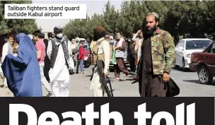  ??  ?? Taliban fighters stand guard outside Kabul airport