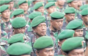  ?? EPA ?? Indonesian Army personnel line up during a security forces drill ahead of today’s Regional Head Elections 2017 in Jakarta, Indonesia, yesterday.